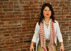 Cheryl Yeoh, a management consultant in New York City, above, wearing a multi-strand necklace in white turquoise and gold and a Deco weave scarf in oranges, both from our Spring 2010 collection.